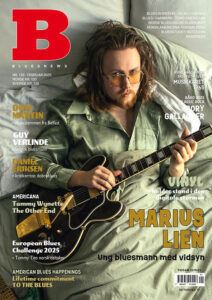 En person med en gitarr.