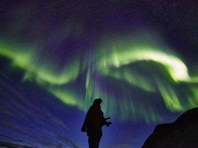 A guest looking at Northern Lights