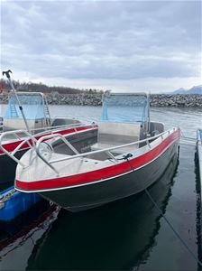 A 19-foot Kværnø aluminium rental boat at the marina at Larseng Kystferie on Kvaløya.