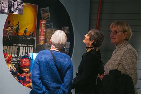 Visitors explore an exhibition about Sámi history and culture at the Arctic University Museum of Norway in Tromsø.