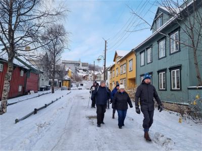 A couple of guests walking out onto the street