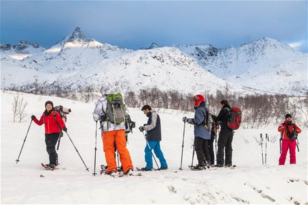 Guests preparing for the snowshoe hike at the starting point
