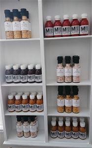 A white shelf with different products.